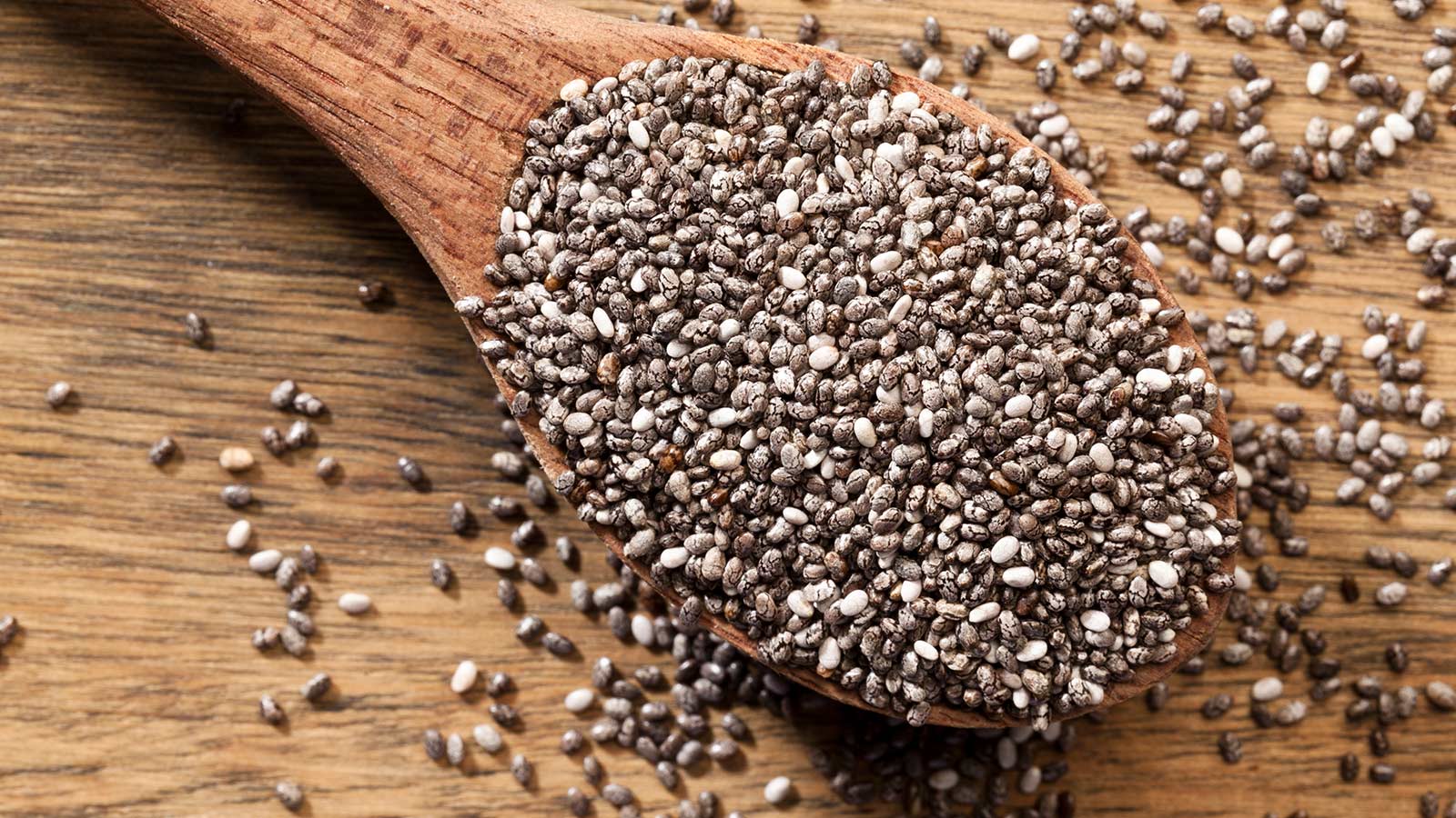 Chia seeds on a wooden spoon