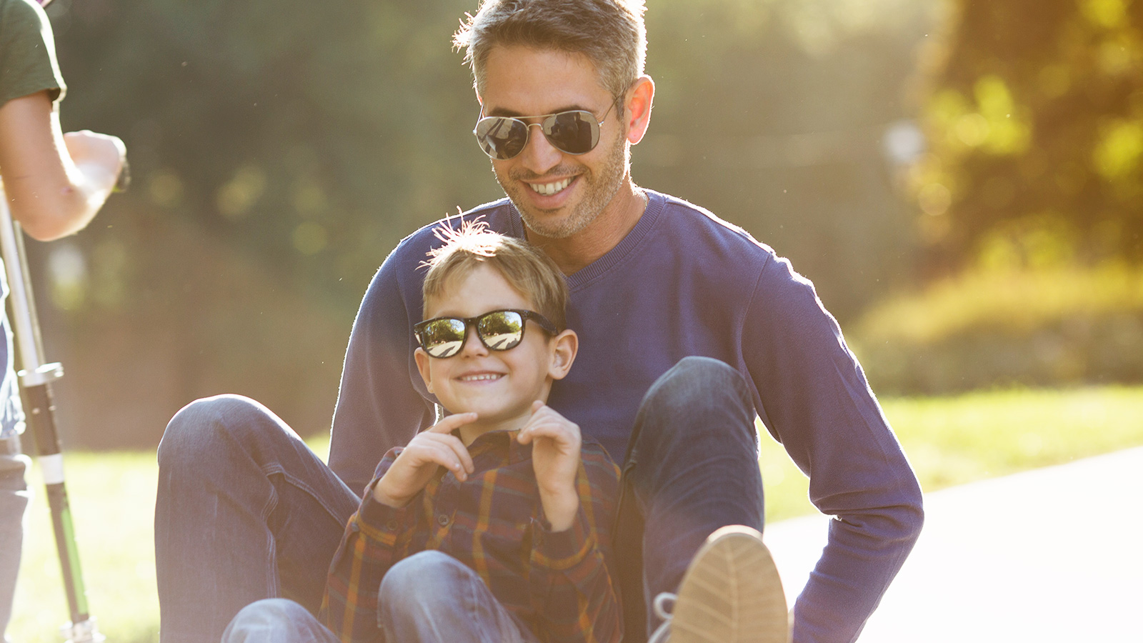 dad and son skateboarding