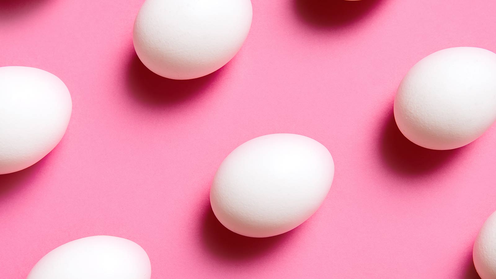 Eggs on pink background
