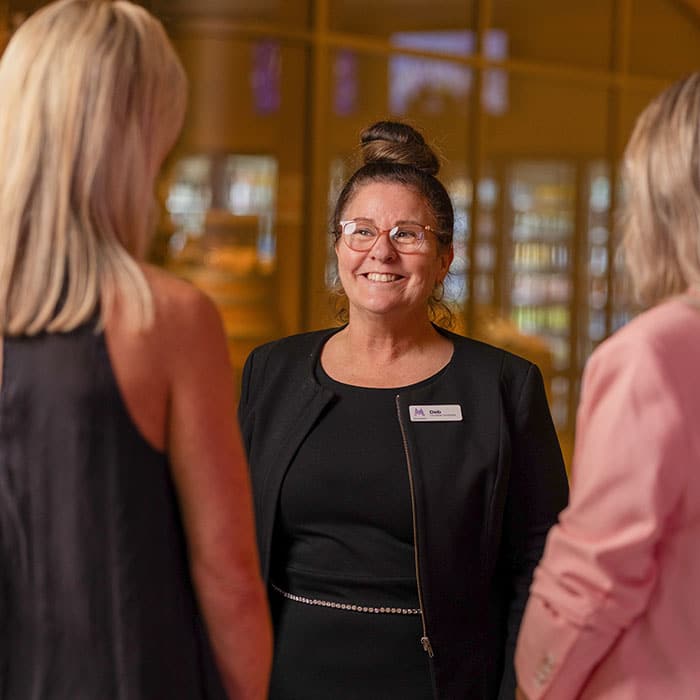 Mingara team member welcoming customers into the venue